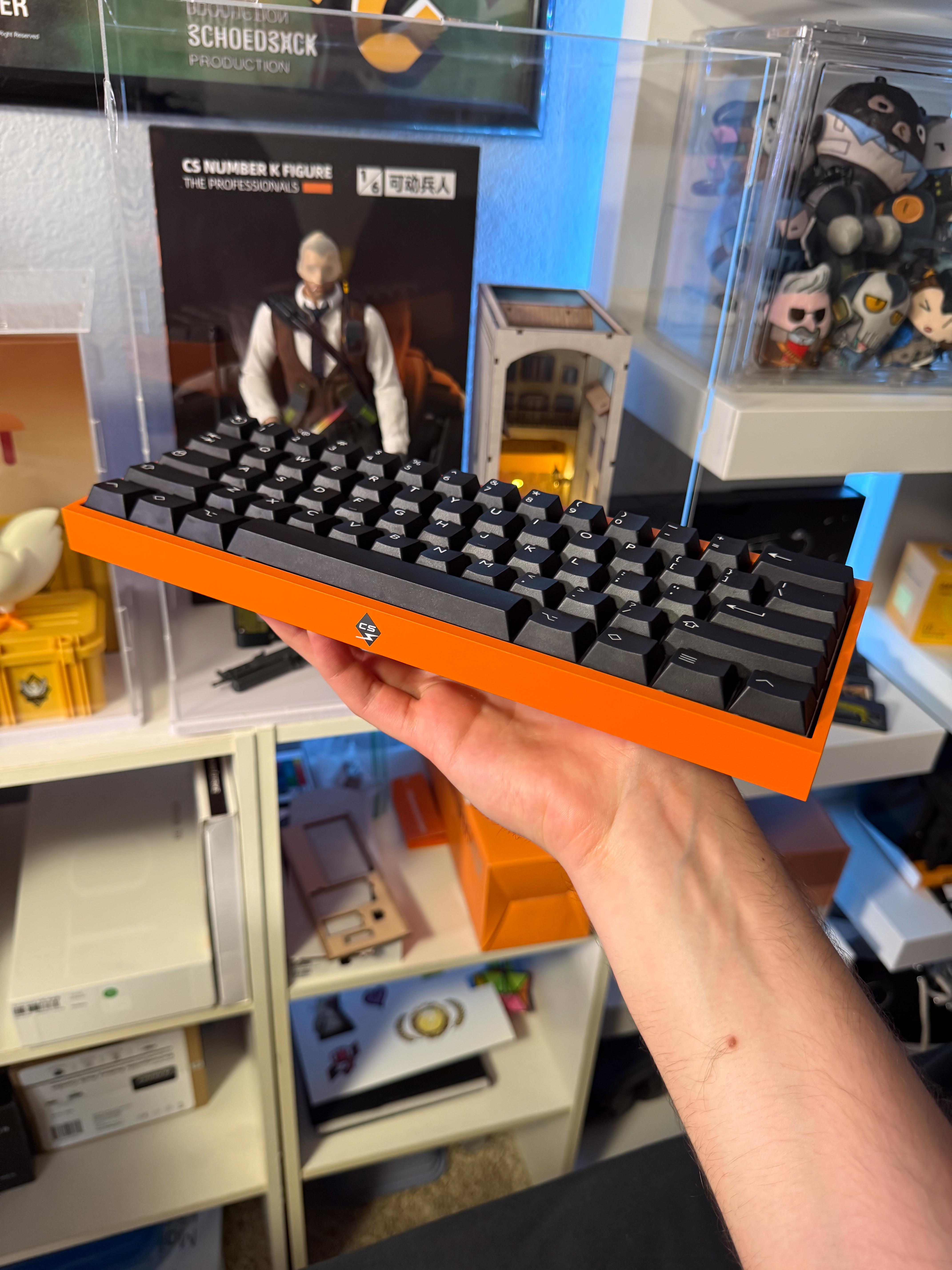 Killowatt wooting back held in front view