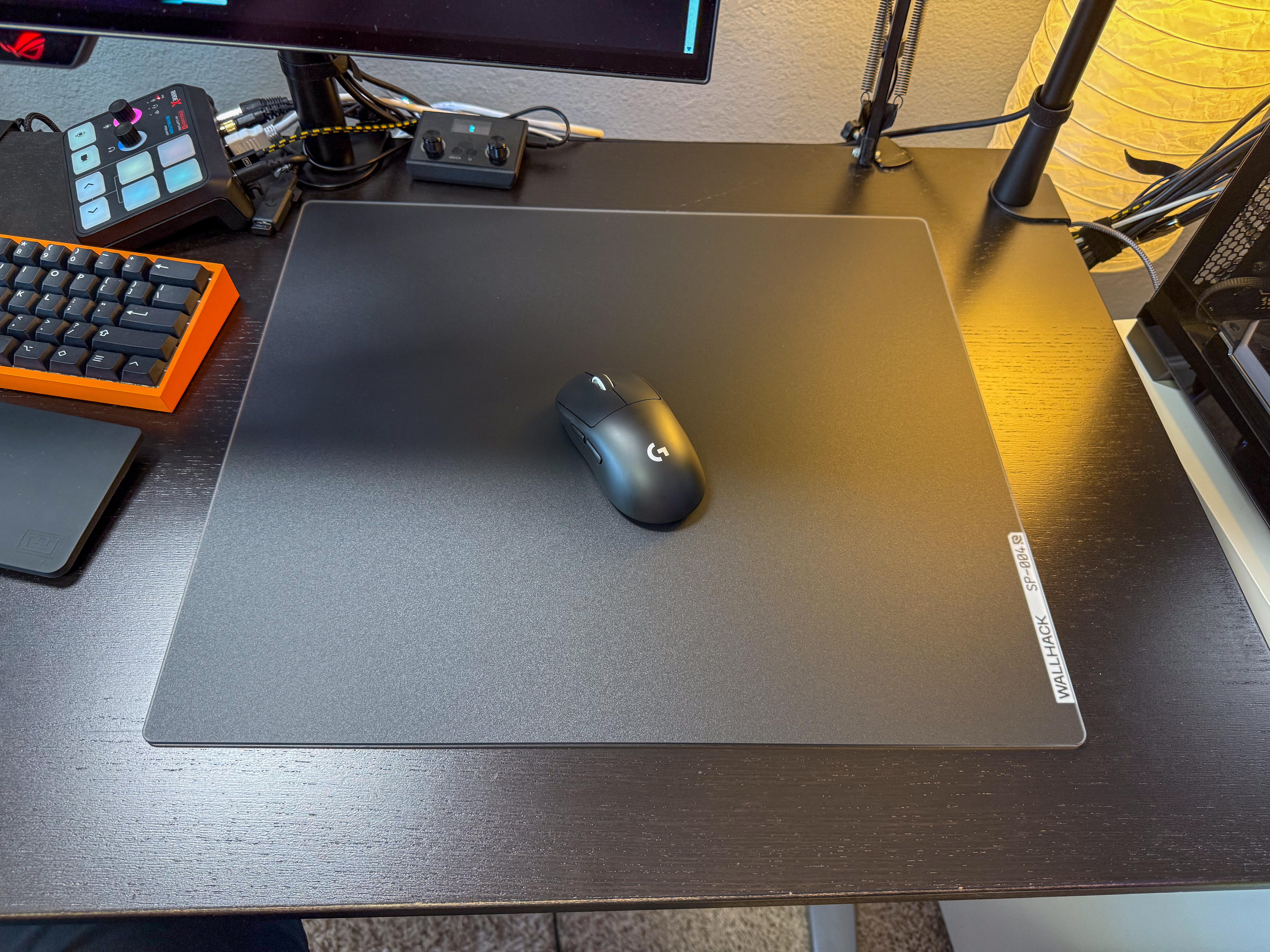 Wallhac kGlass mouse pad with g pro superlight sitiing on top