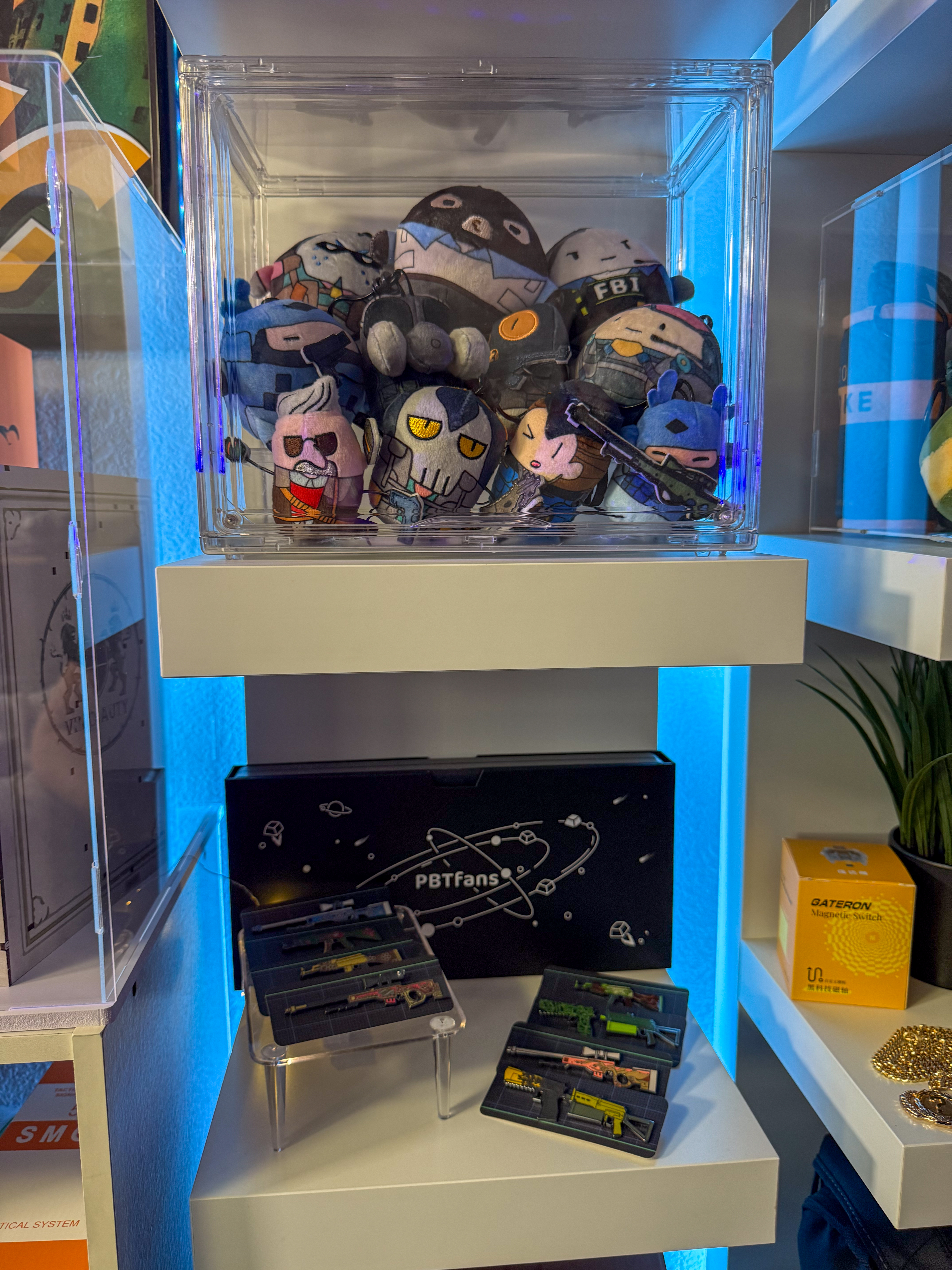 Top Shagnhai cs2 agent plushies and stress balls. Bottom Weapon skin pins